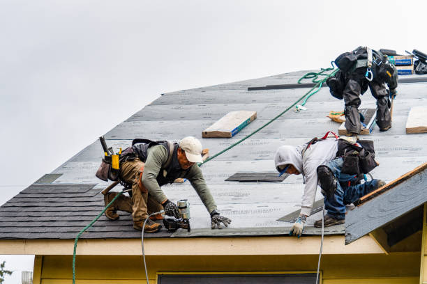 Professional Roofing technician working in Oakfield, WI